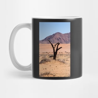 One tree in the desert. Mug